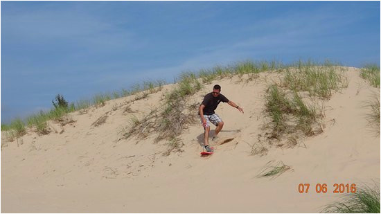 surfing the dunes picture of silver lake sand dunes hart