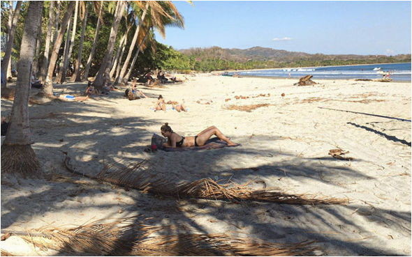 google maps street view bikini woman in optical illusion on costa